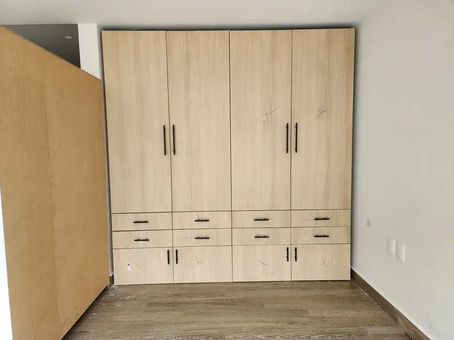 Photograph of the custom closet built and installed in the apartment